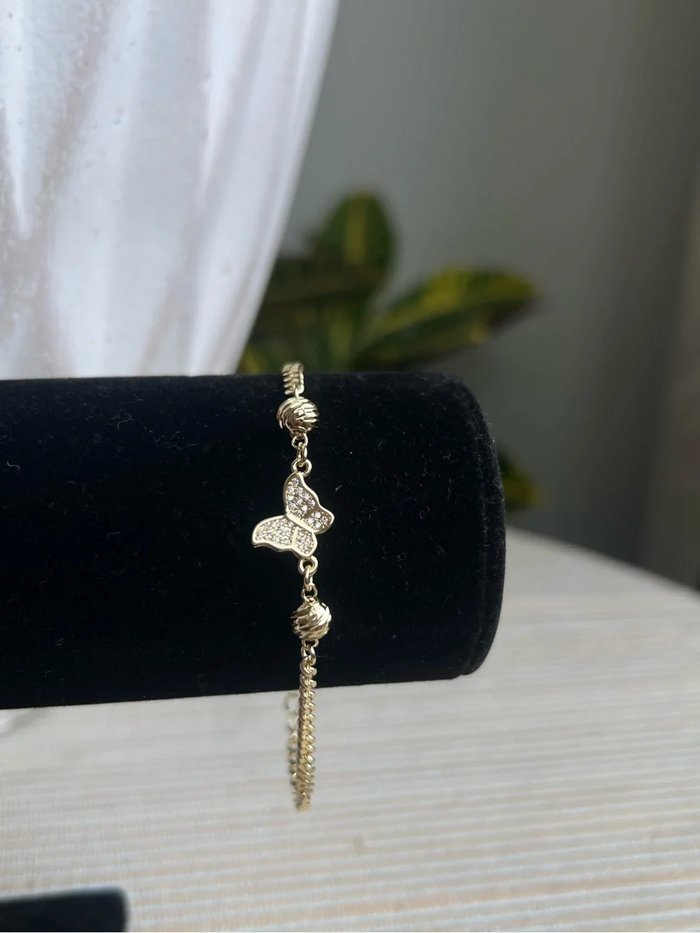 Gold pavé Butterfly Bracelet with round swirly accents